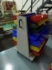 Double sided mobile storage bin rack (contents not included)