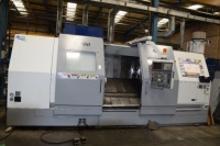 Doosan S700 slant bed CNC Lathe with integrated filter mist system, workbench and a quantity of tooling S/N LSH 1012 (2006)&nbsp;(A Method Statement and Risk Assessment must be provided, reviewed and approved by the Auctioneer prior to any removal work commenc