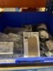 Contents of racking to include various sized tapped plugs and coils - 2