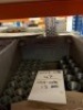 Contents of racking to include various sized tapped plugs and coils - 5
