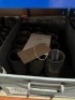 Contents of racking to include various sized tapped plugs and coils - 8