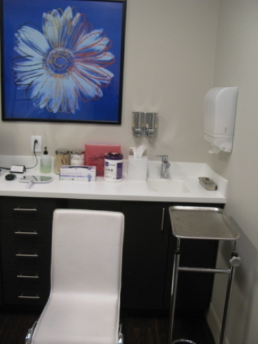 Wall Art; Stool on wheels; White Leather Side Chair