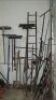 Lot -- shovels, post hole digger, pick, brooms, etc on wall *** PLEASE NOTE: This lot is offered subject to bulk bid offer on lot 118